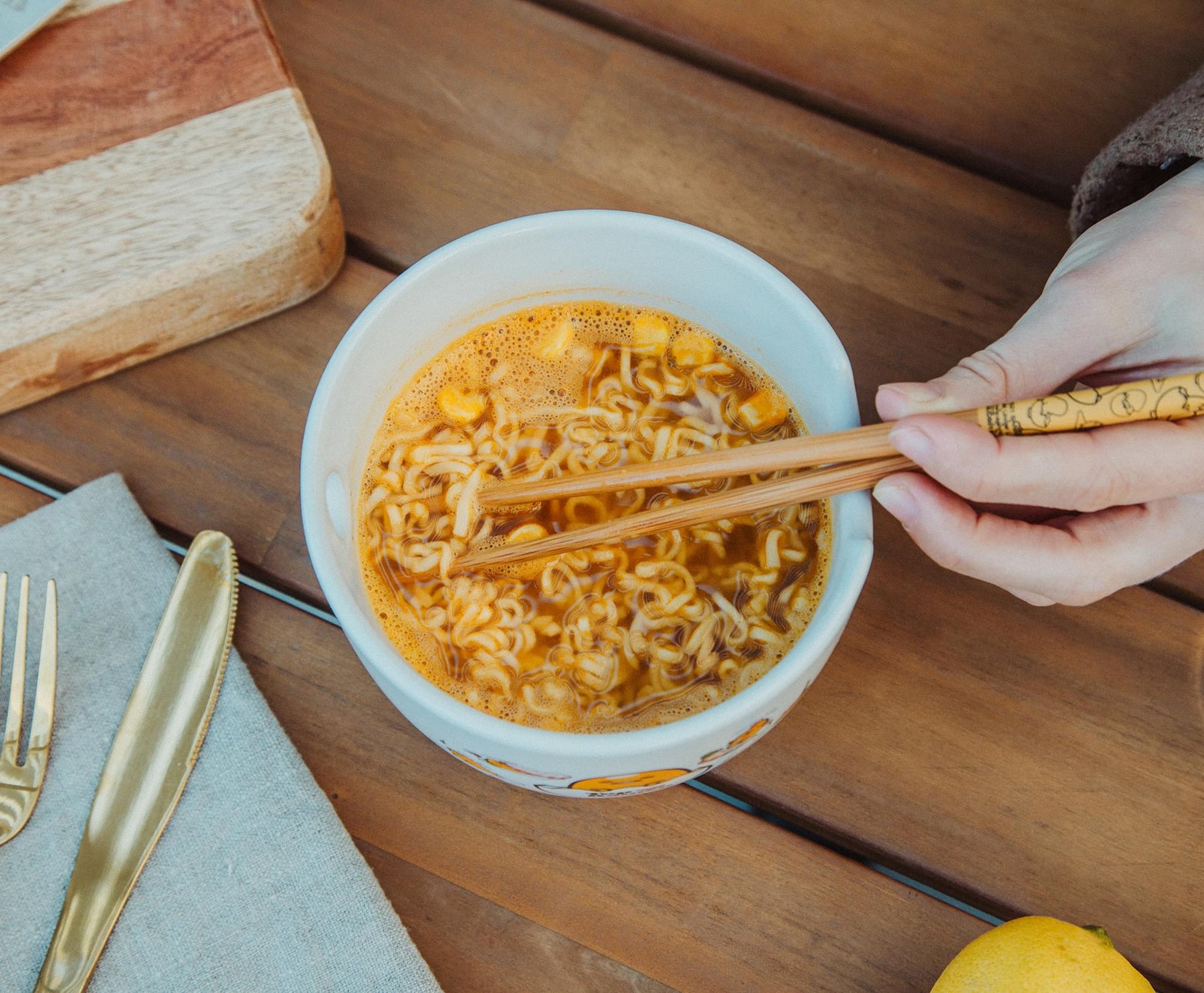 Sanrio Gudetama x Nissin Top Ramen Yolk Poses 20-Ounce Ramen Bowl With Chopsticks
