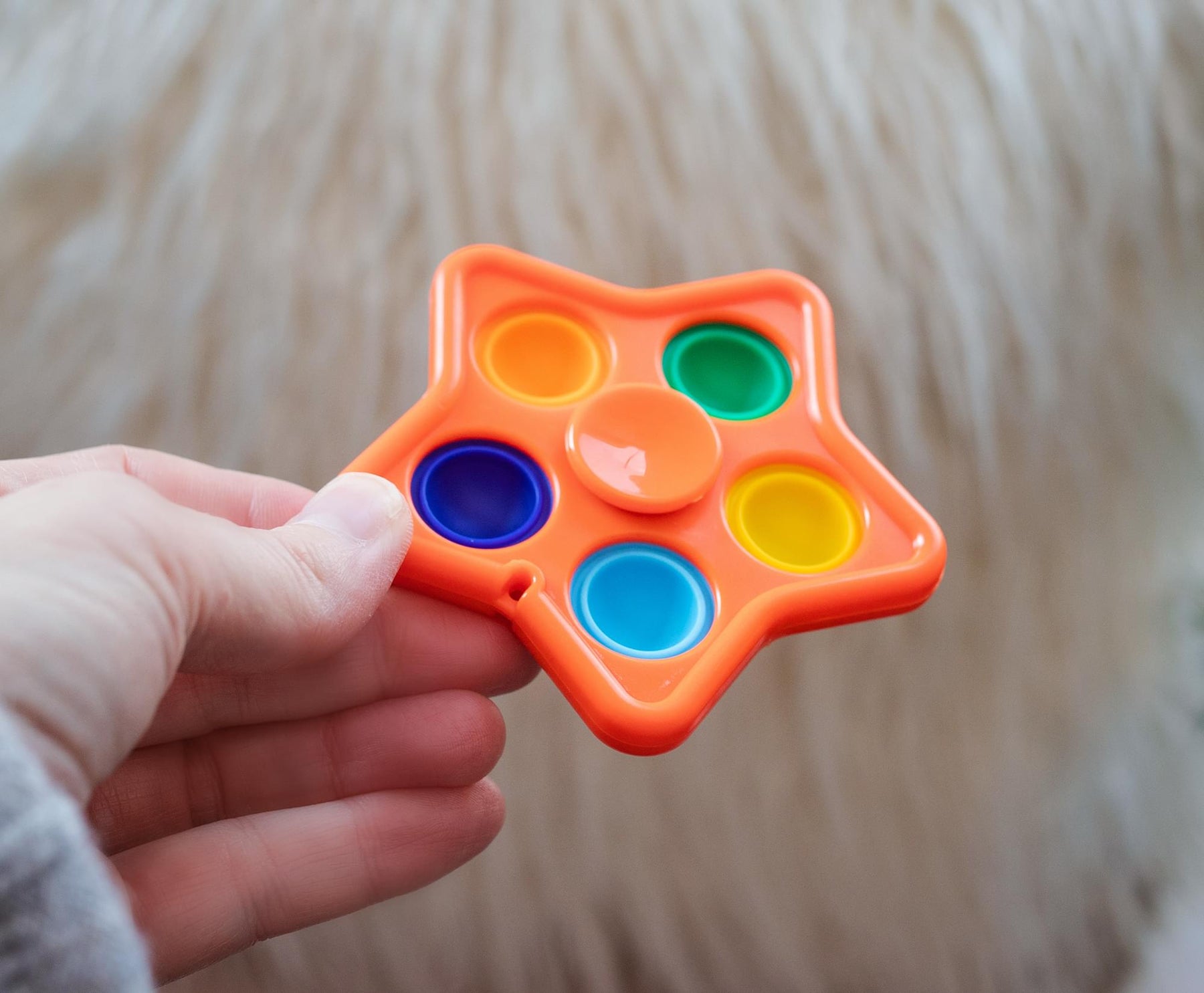 Pop Fidget Toy Spinner Orange Star 5-Button Bubble Popping Game