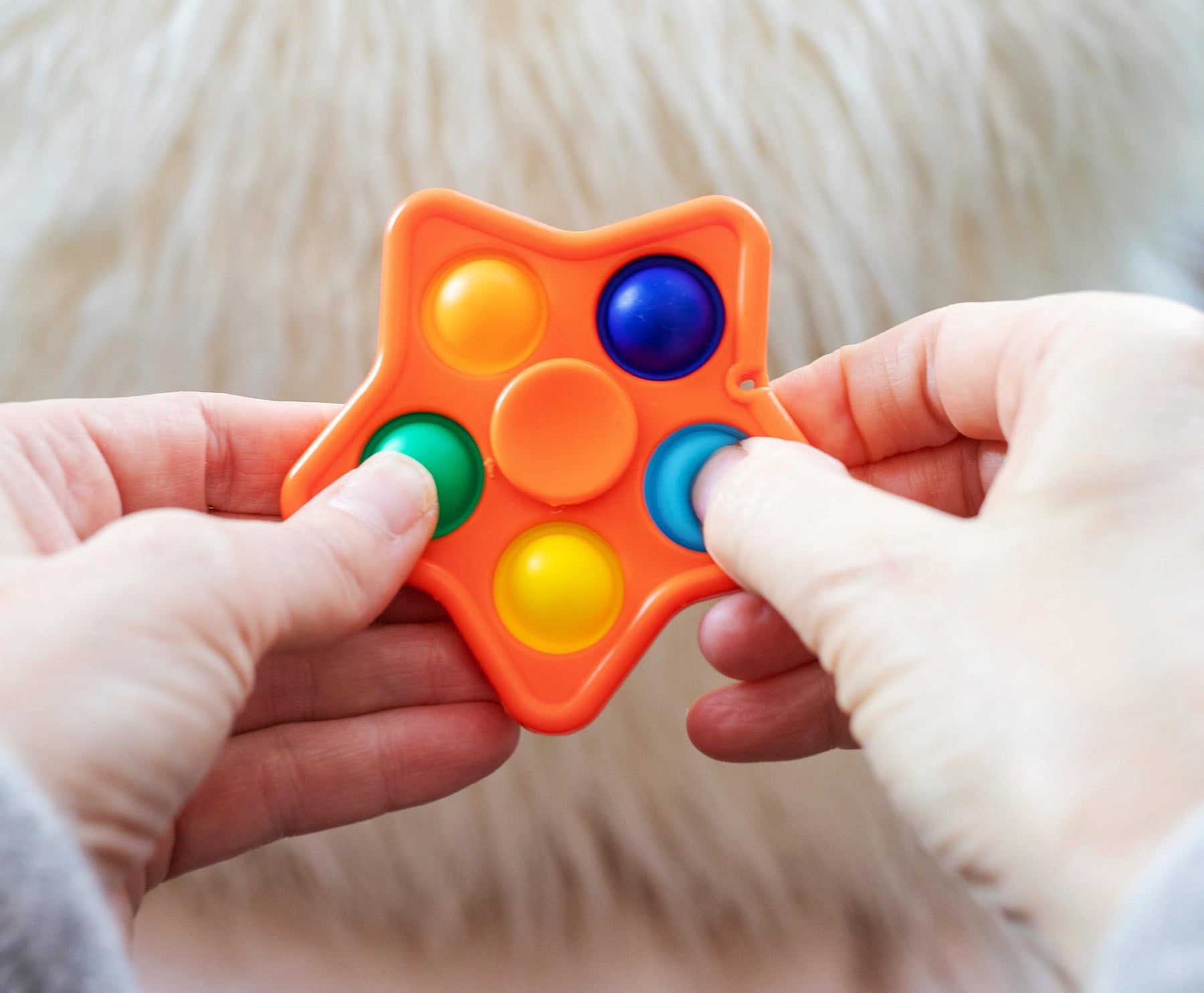 Pop Fidget Toy Spinner Orange Star 5-Button Bubble Popping Game