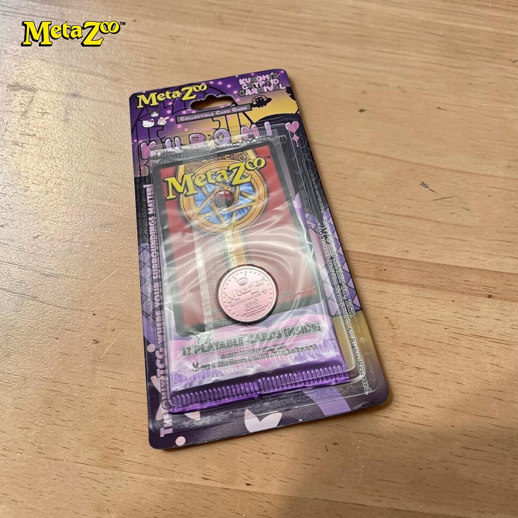 MetaZoo TCG Helly Kitty Kuromo Booster Pack | 12 Cards