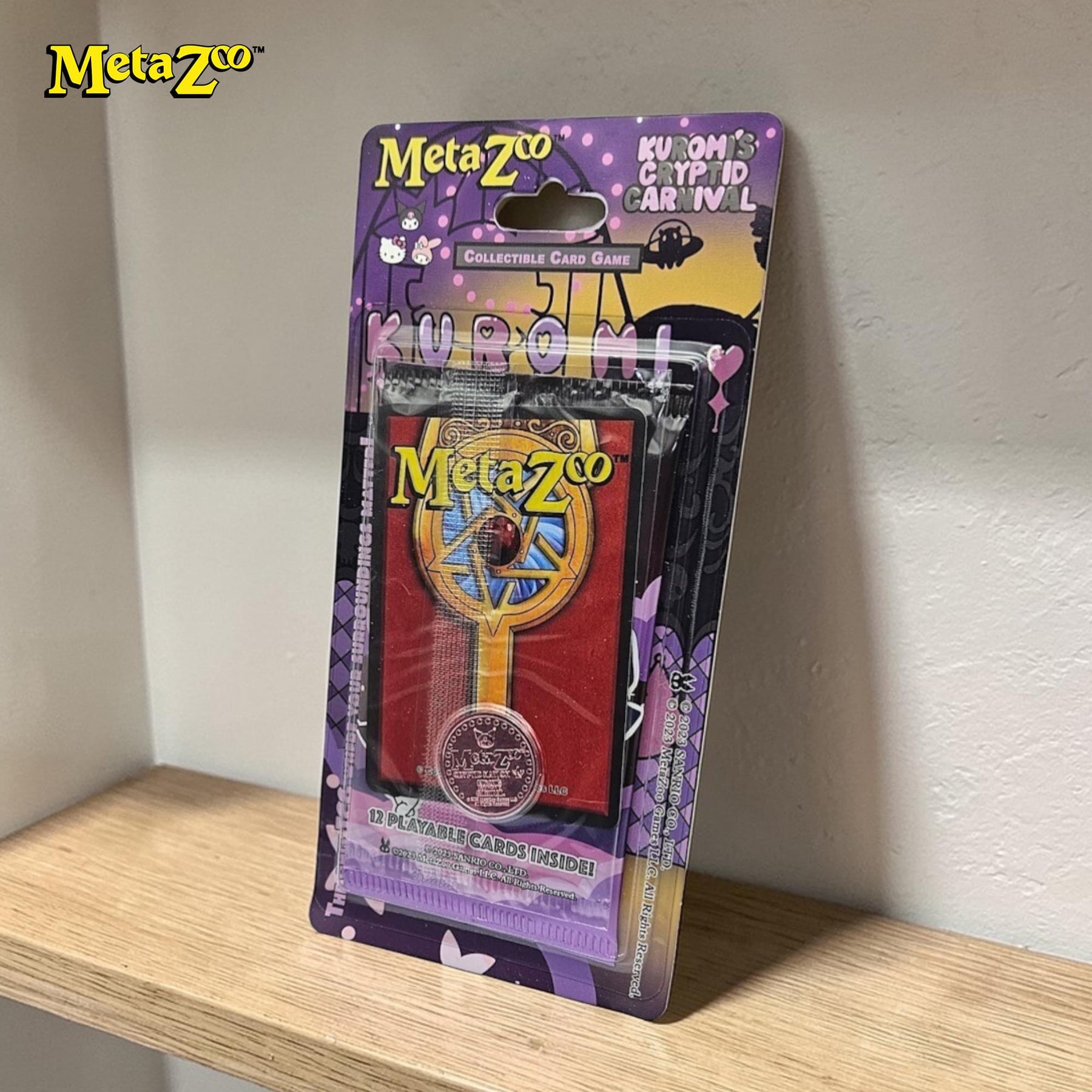 MetaZoo TCG Helly Kitty Kuromo Booster Pack | 12 Cards
