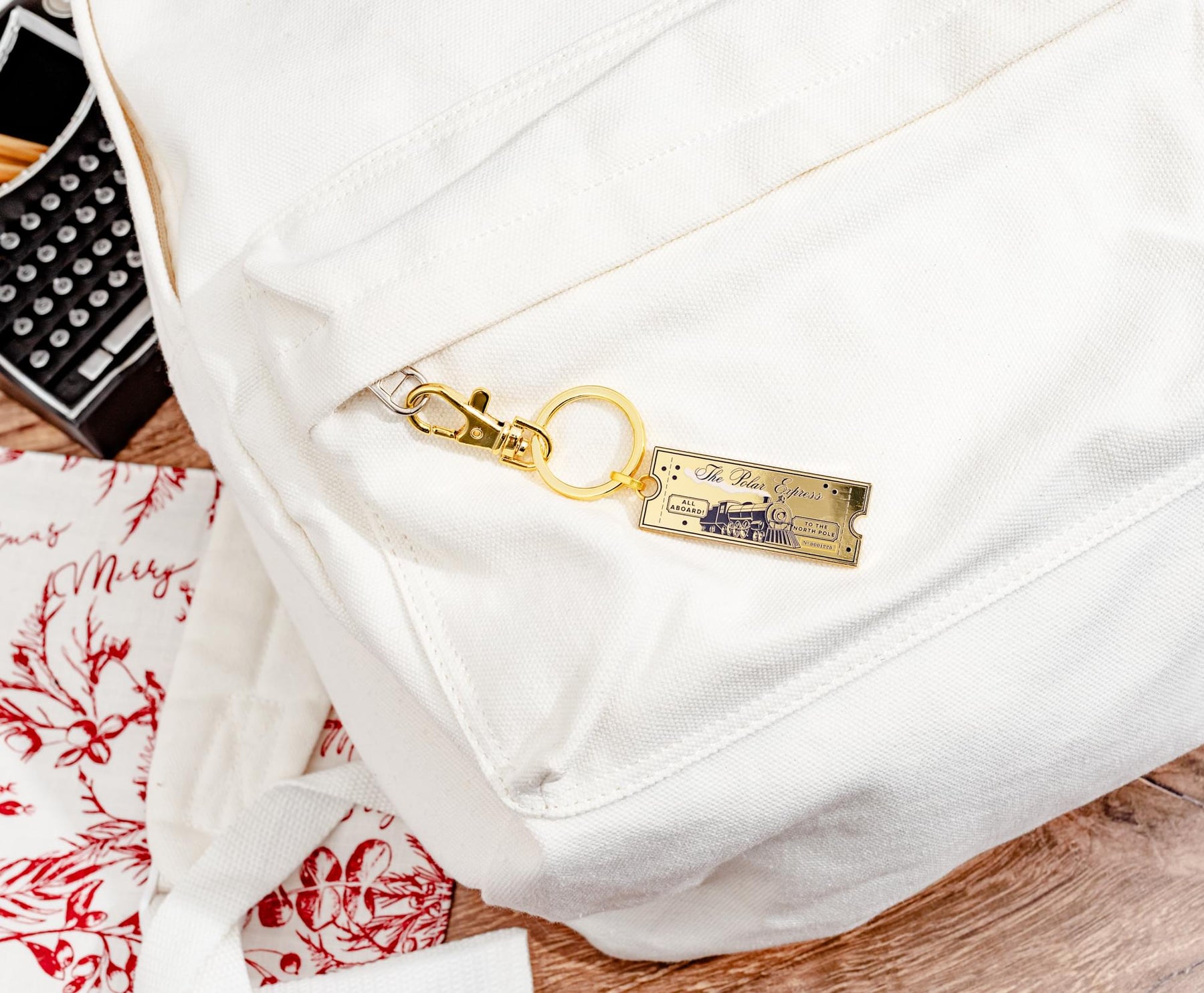 The Polar Express "Believe" Gold Train Ticket Enamel Charm Keychain
