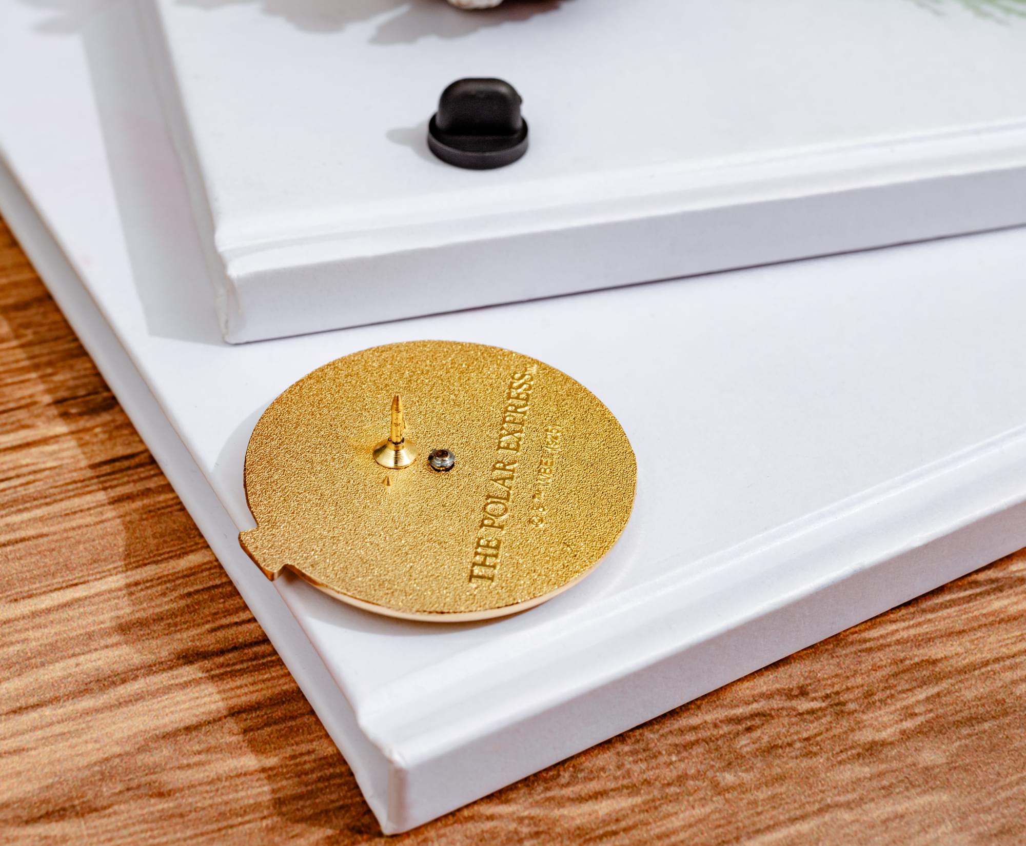 The Polar Express Conductor's Stopwatch Spinning Enamel Pin