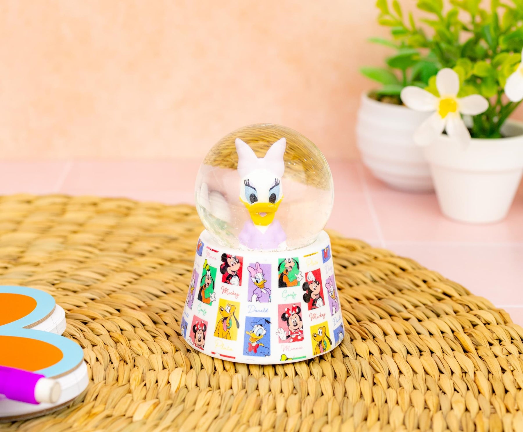 Disney Daisy Duck 3-Inch Mini Light-Up Snow Globe