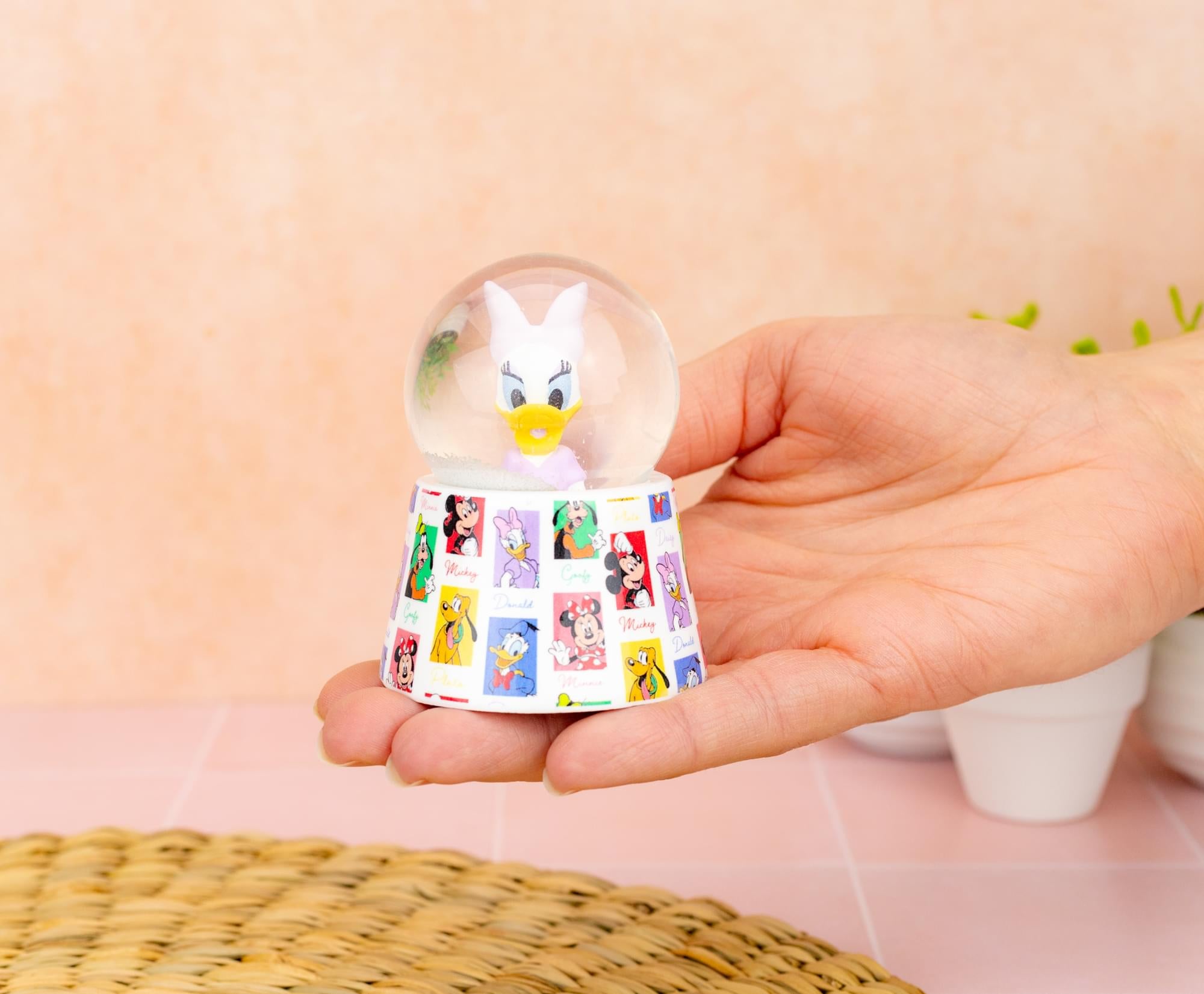 Disney Daisy Duck 3-Inch Mini Light-Up Snow Globe