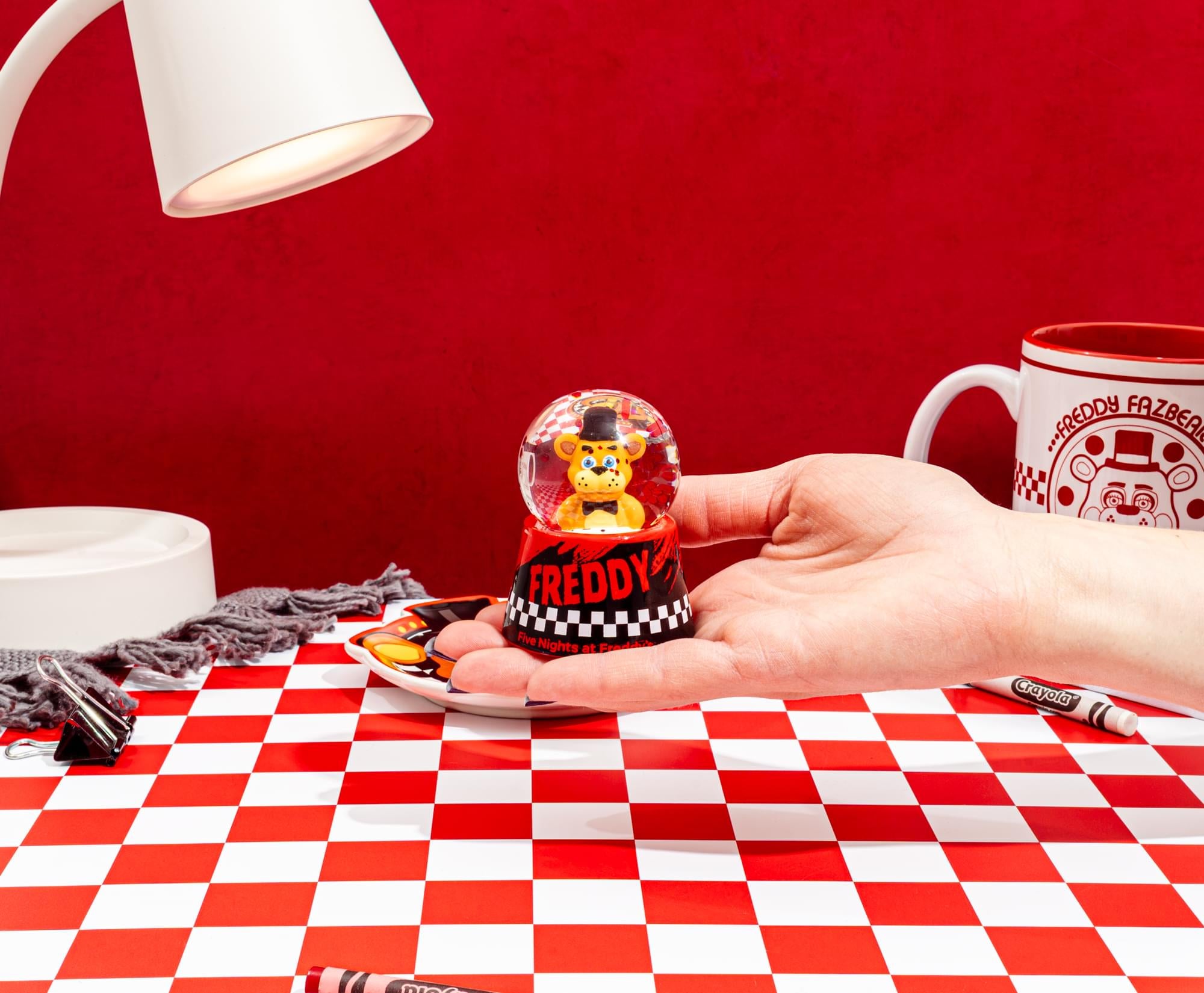 Five Nights At Freddy's Freddy Fazbear 3-Inch Mini Light-Up Snow Globe