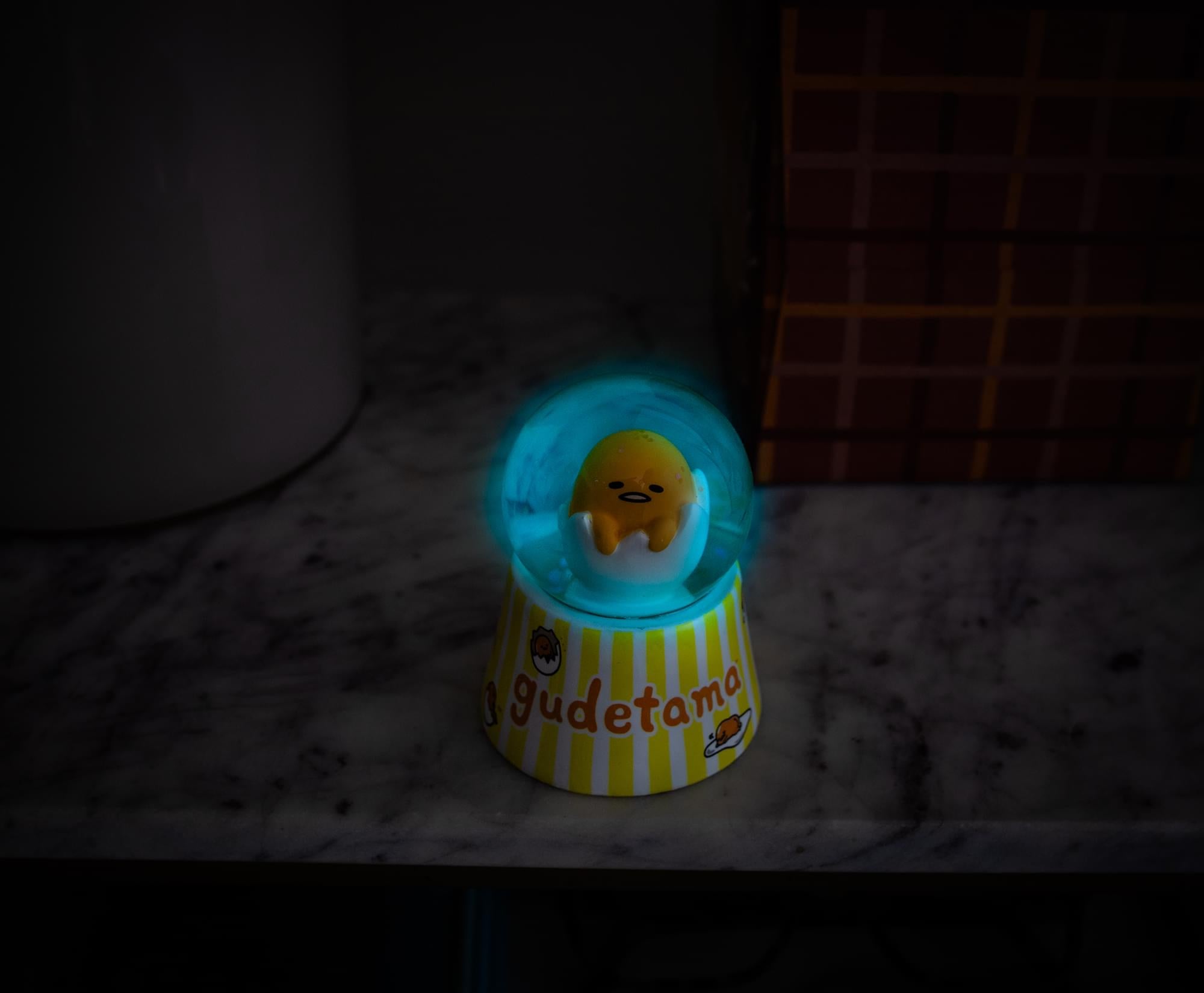 Sanrio Gudetama Mini Light-Up Snow Globe | 3 Inches Tall