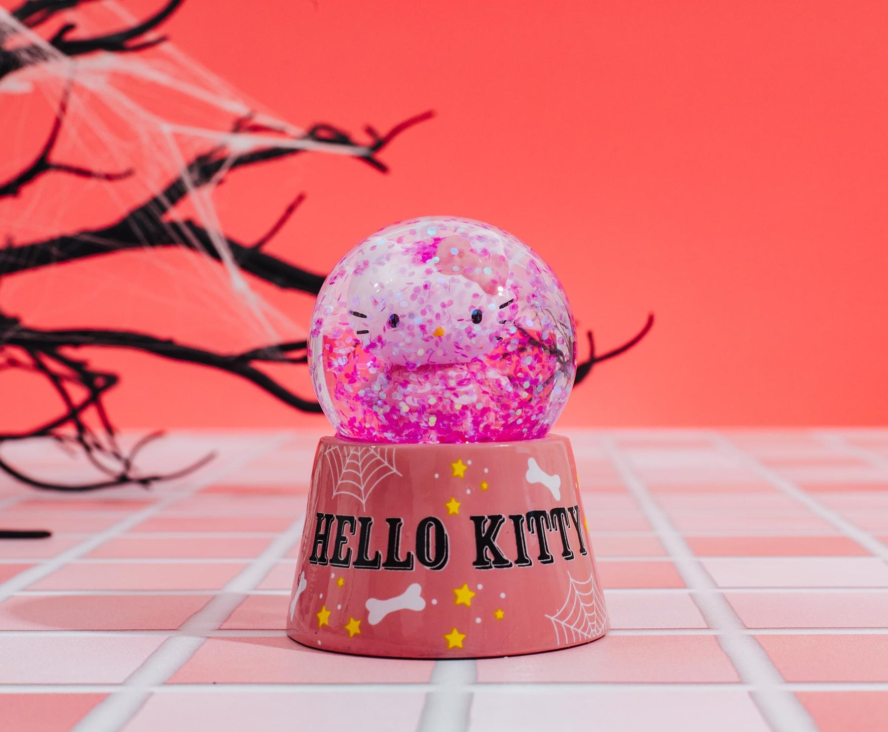 Sanrio Hello Kitty Pink Skeleton 3-Inch Mini Light-Up Snow Globe