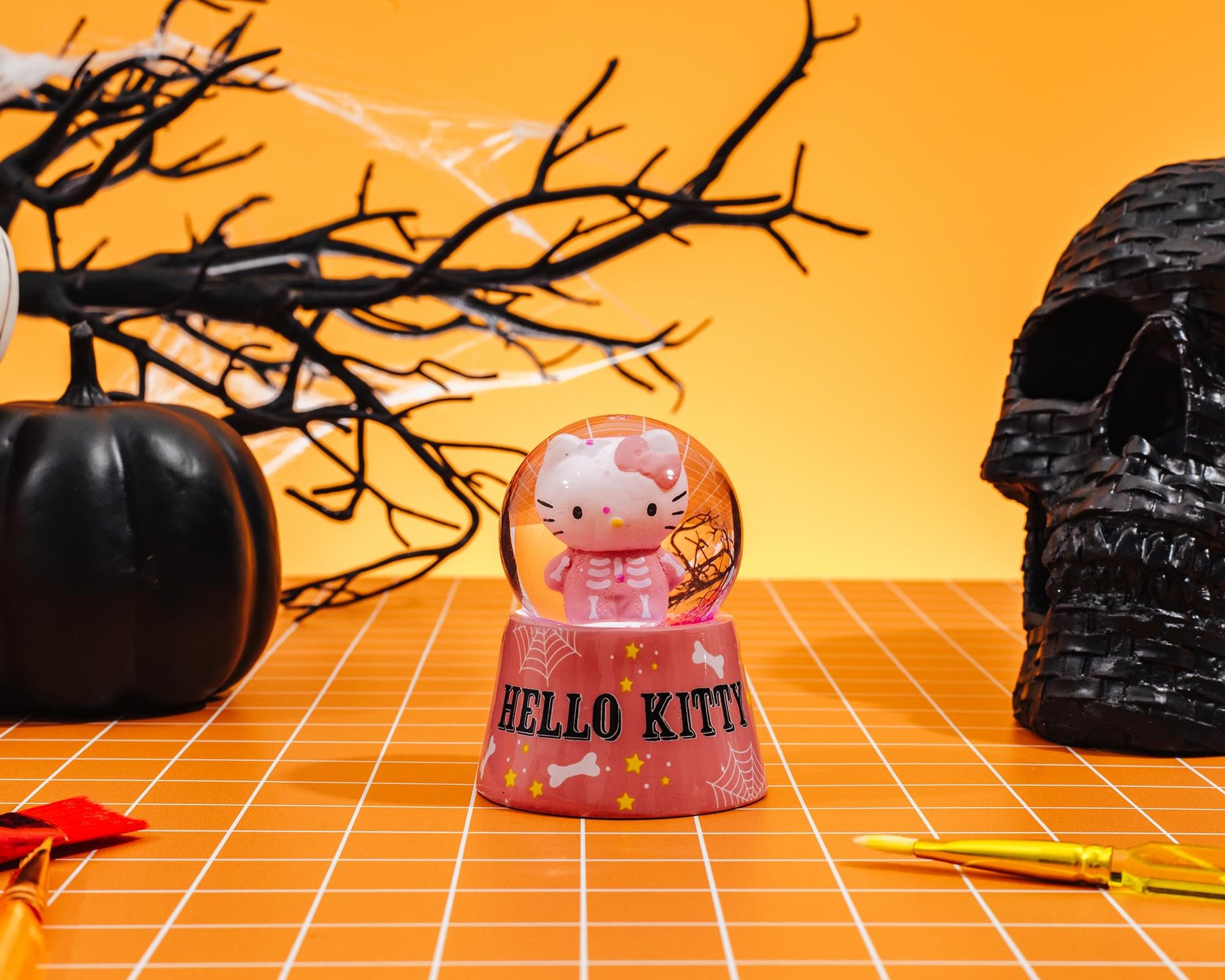 Sanrio Hello Kitty Pink Skeleton 3-Inch Mini Light-Up Snow Globe
