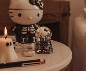 Sanrio Hello Kitty Black Skeleton Mini Light-Up Snow Globe | 3 Inches Tall