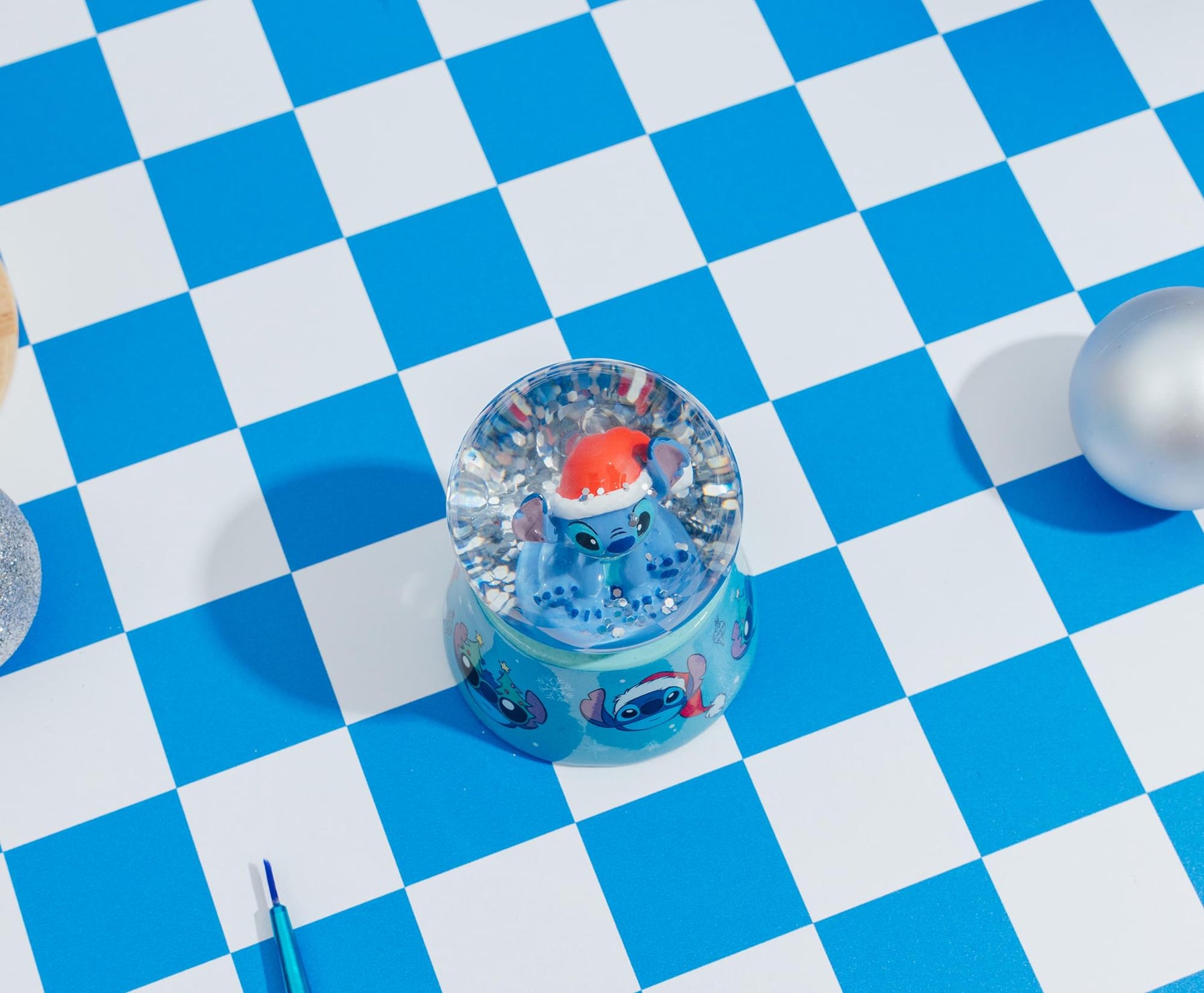 Disney Lilo & Stitch Santa Stitch 3-Inch Mini Light-Up Snow Globe