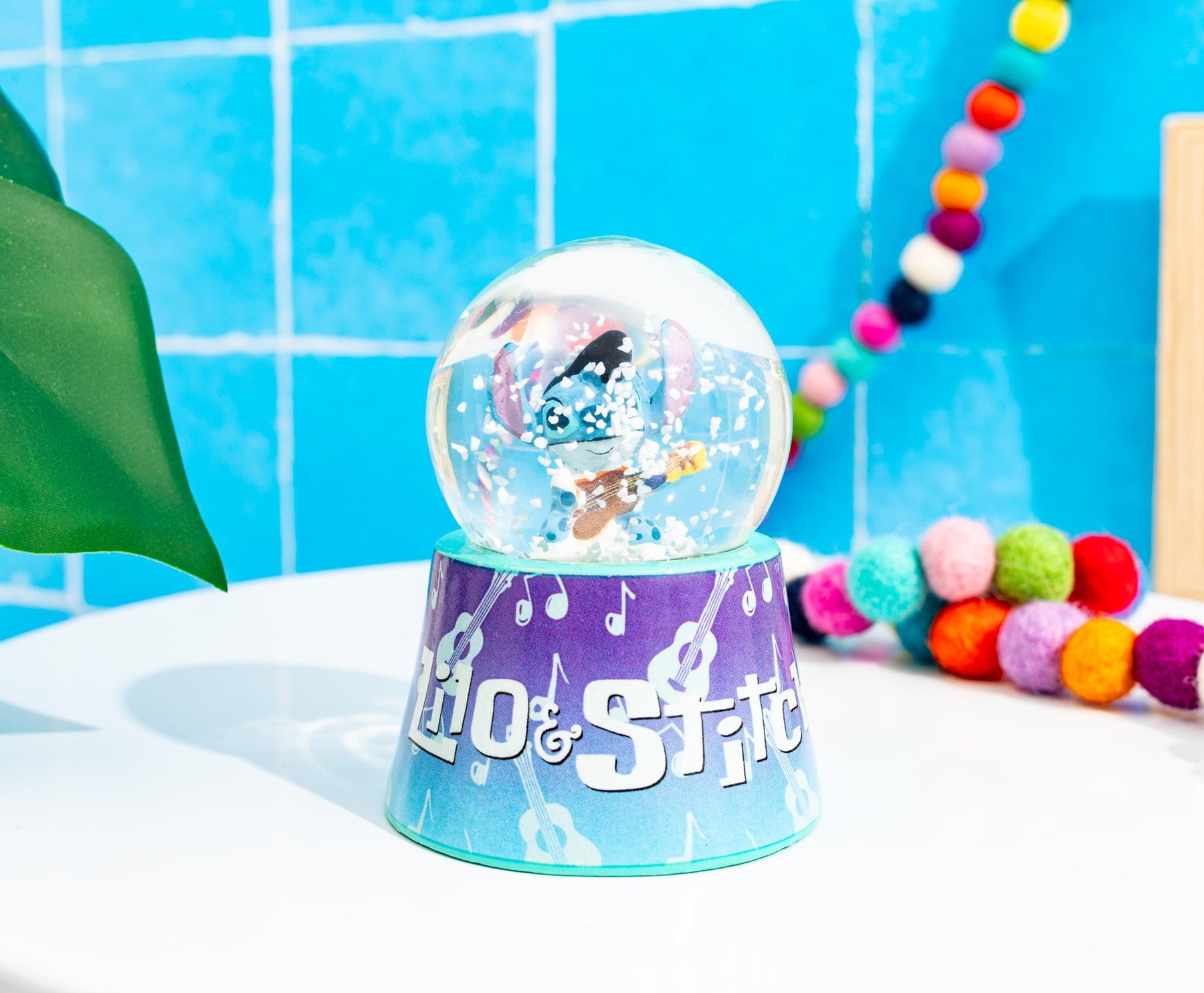 Disney Lilo & Stitch Elvis Stitch 3-Inch Mini Light-Up Snow Globe
