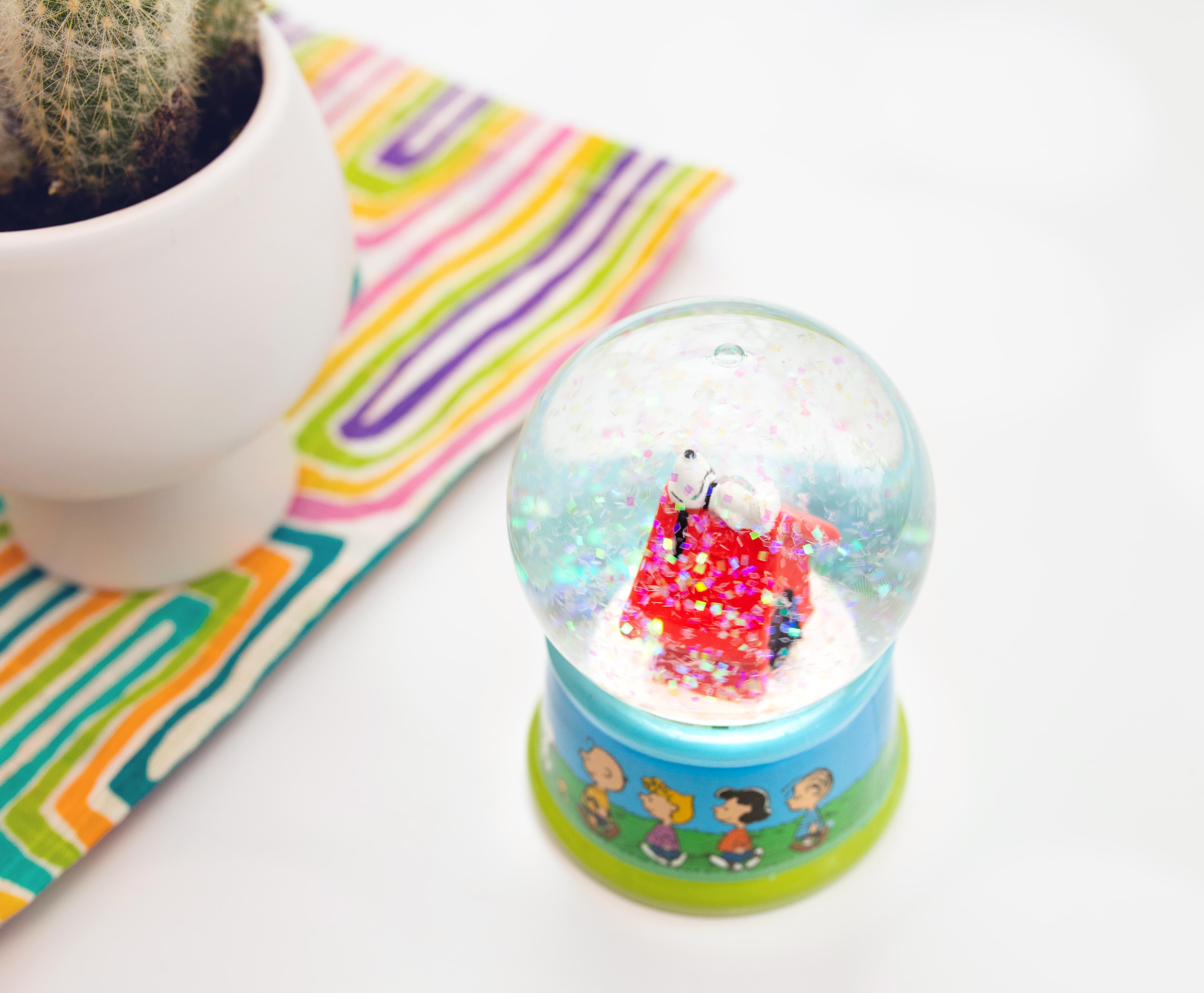 Peanuts Snoopy Doghouse Light-Up Snow Globe | 3 Inches Tall