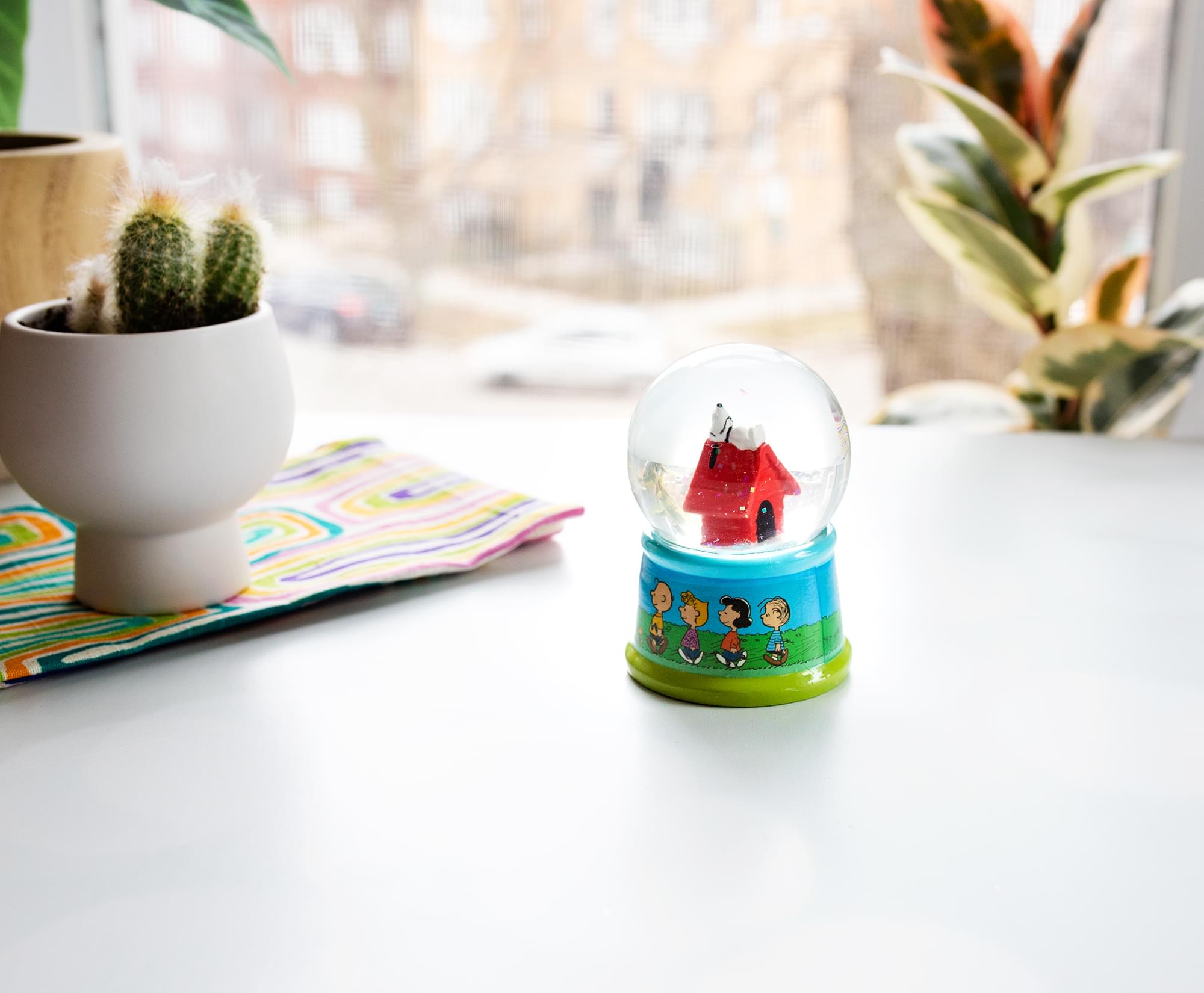 Peanuts Snoopy Doghouse Light-Up Snow Globe | 3 Inches Tall
