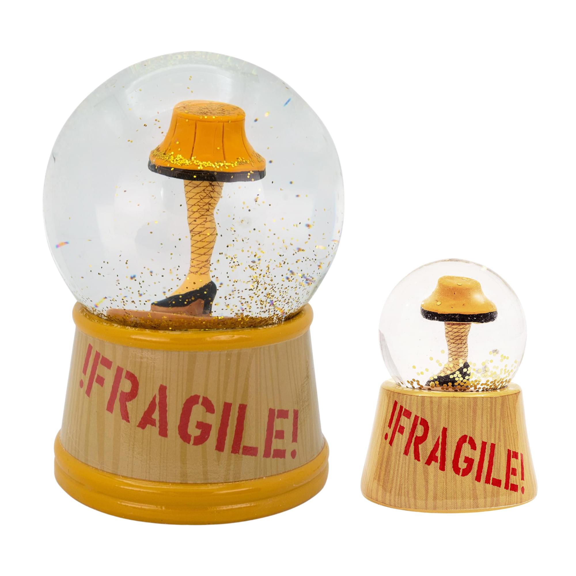 A Christmas Story Leg Lamp 3-Inch Mini and 6-Inch Large Light-Up Snow Globe Set
