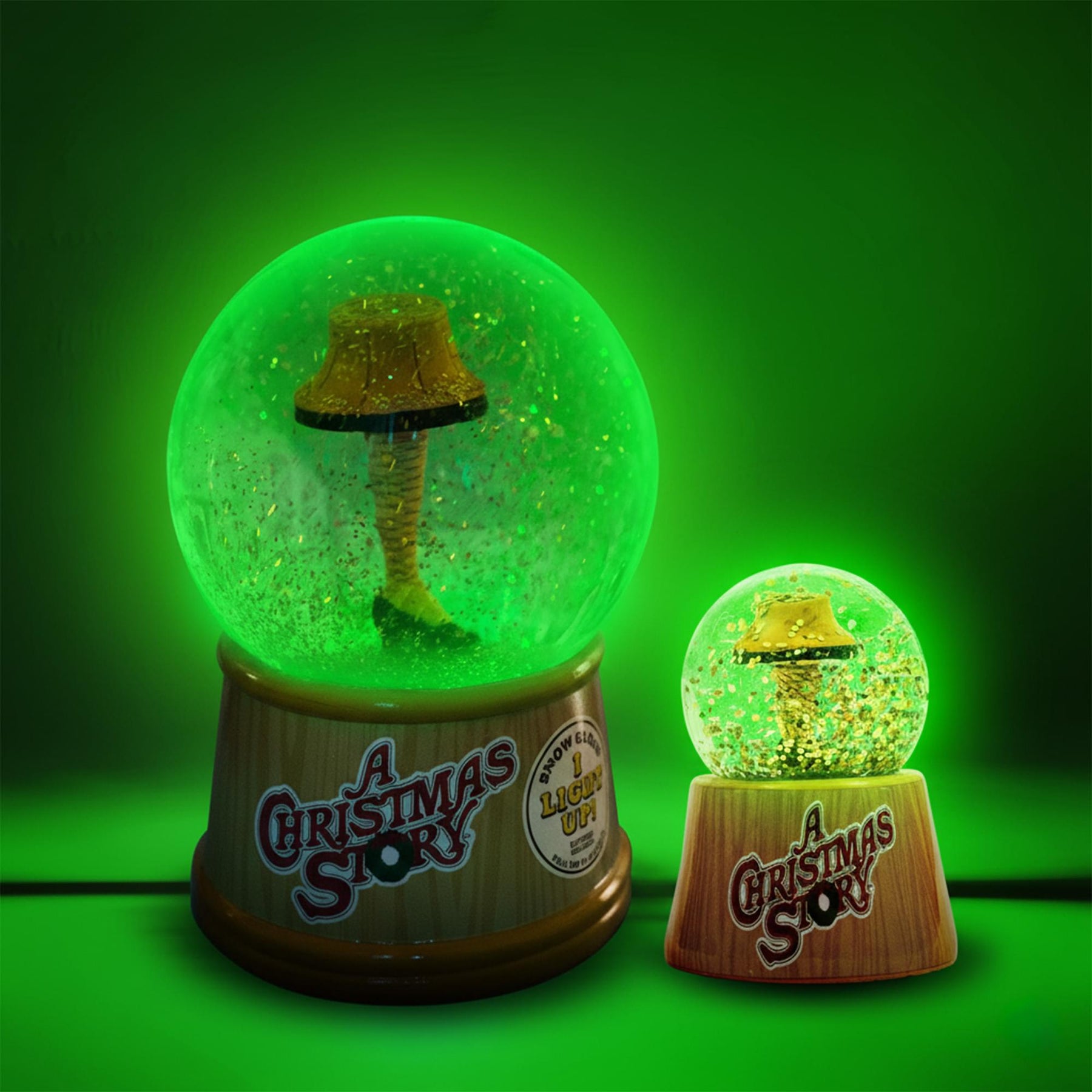 A Christmas Story Leg Lamp 3-Inch Mini and 6-Inch Large Light-Up Snow Globe Set