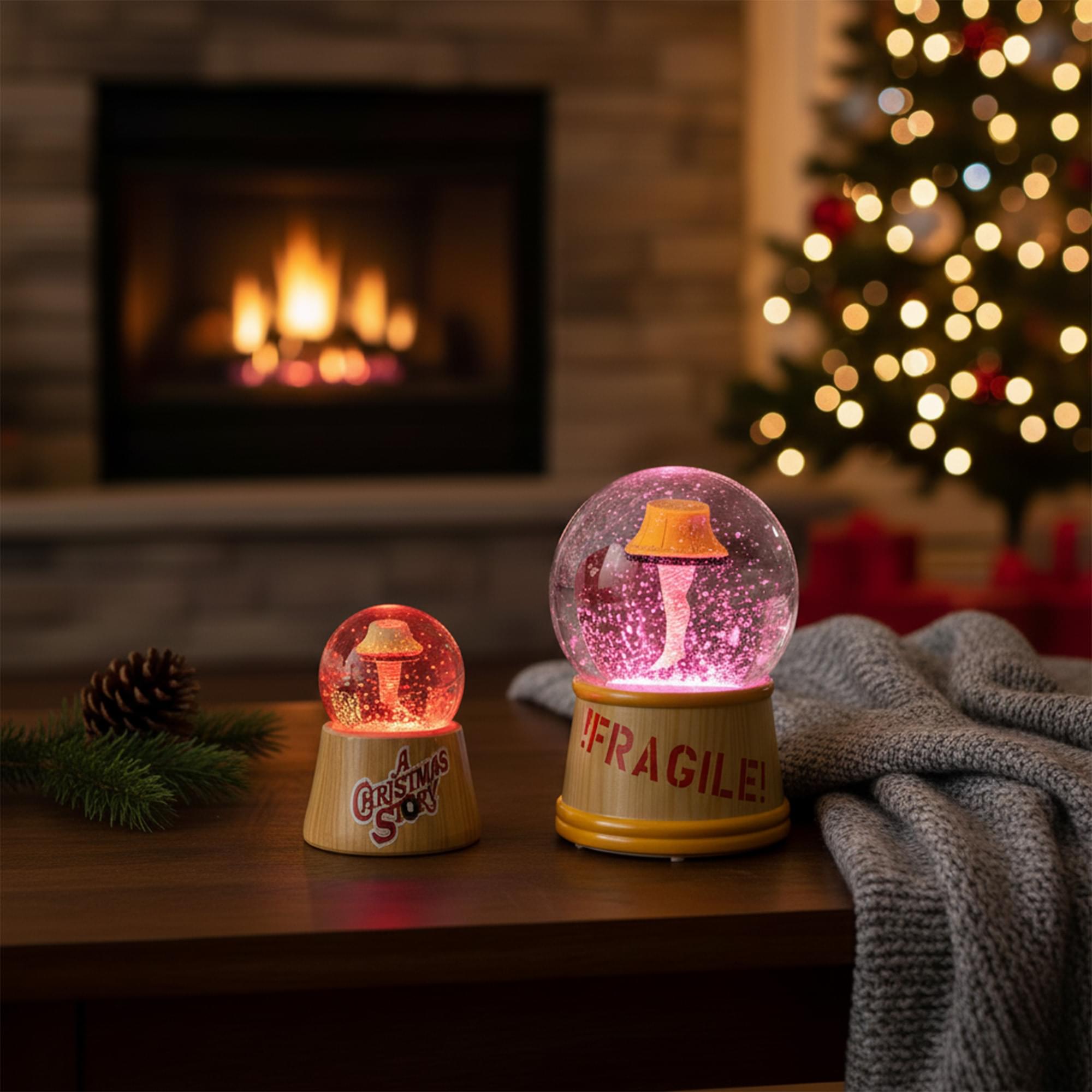 A Christmas Story Leg Lamp 3-Inch Mini and 6-Inch Large Light-Up Snow Globe Set