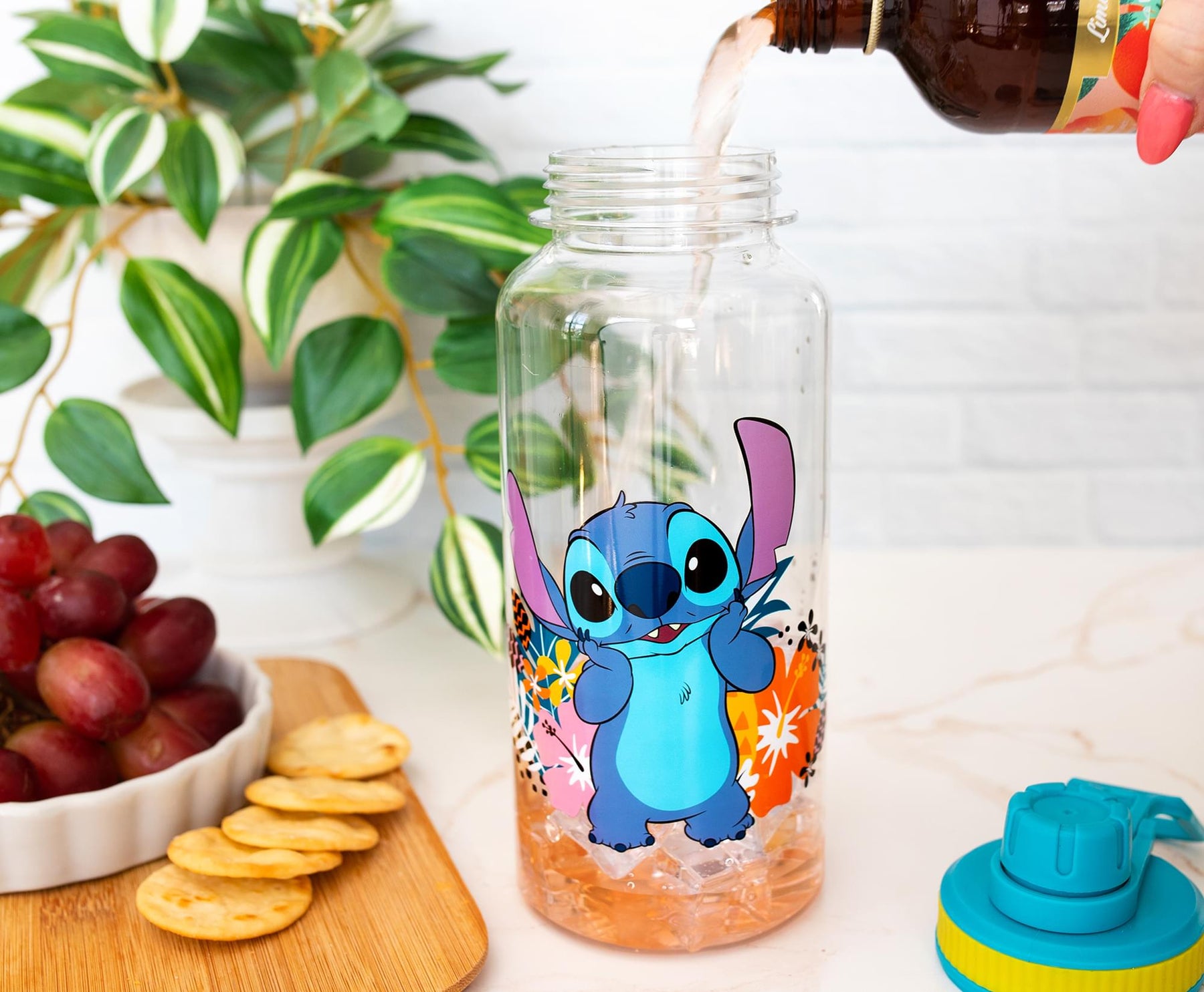 Disney Lilo & Stitch Flowers 32-Ounce Twist Spout Water Bottle And Sticker Set