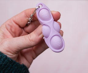 Pop Fidget Toy Purple 4-Button Silicone Keychain Accessory