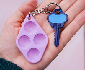 Pop Fidget Toy Purple 4-Button Silicone Keychain Accessory