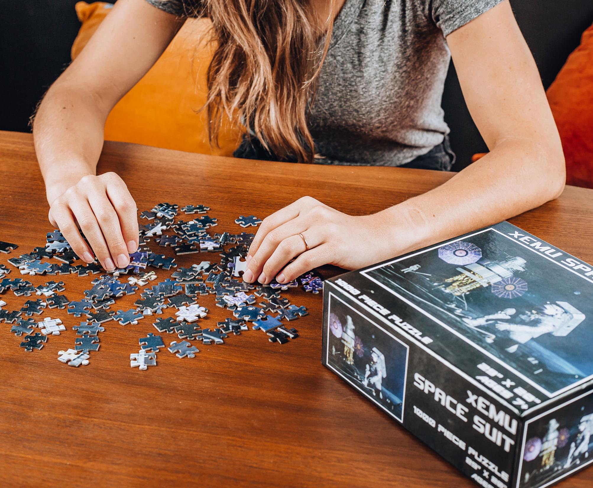 xEMU Space Suit Moon Puzzle | 1000 Piece Jigsaw Puzzle